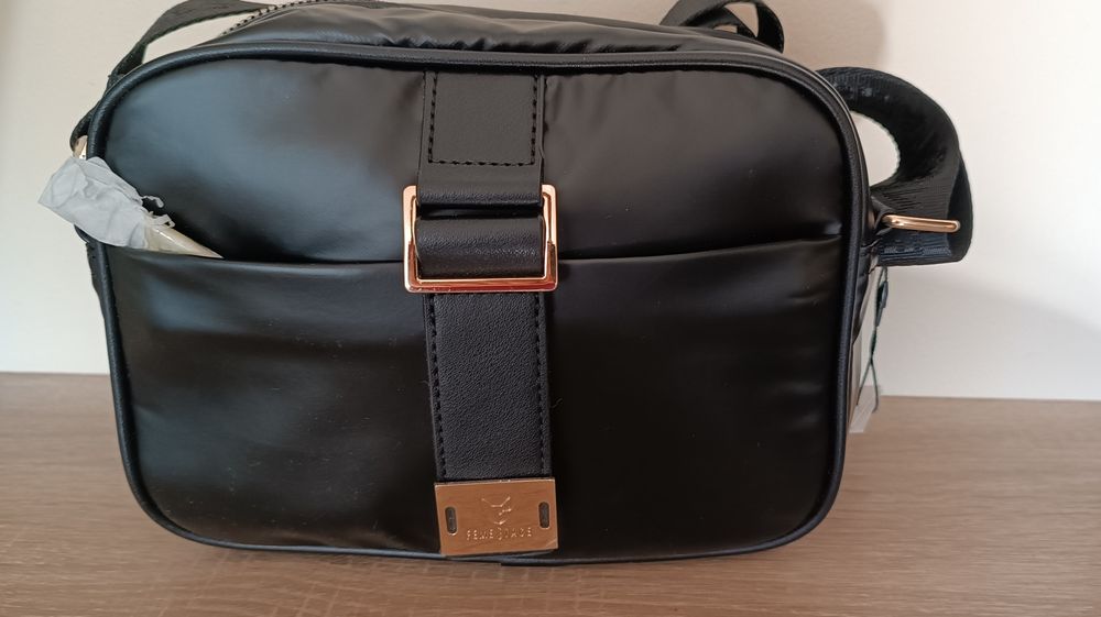 Sprzedam torebkę listonoszkę Ewa Minge