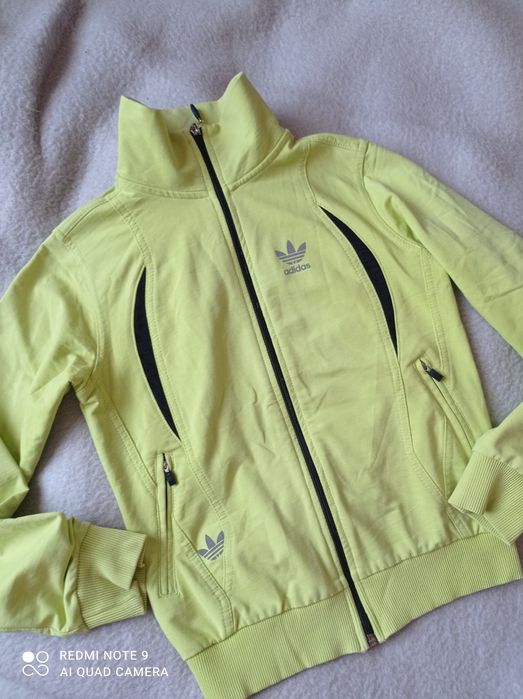 Adidas bluza limonka rozmiar na metce XXL ale to XXS w opisie wymiarki