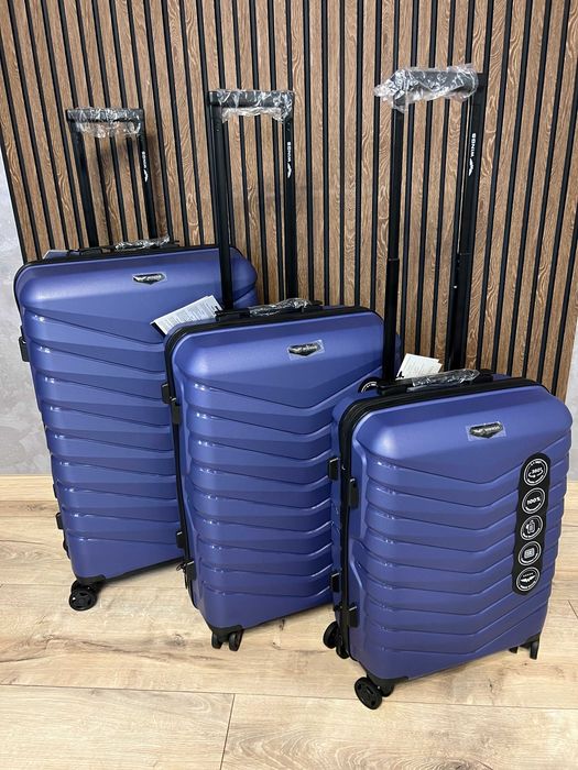 Валіза дорожня з поліпропілену подвійні колеса НЕ ТРІСКАЄ Чемодан PHX