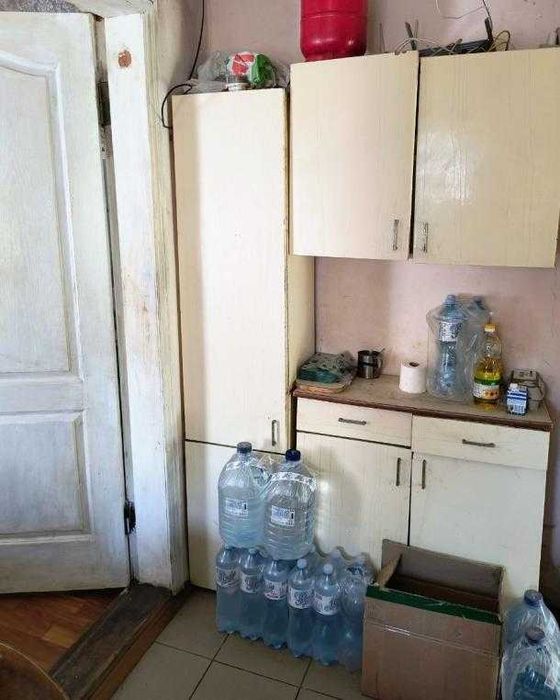 Продам 1/2 дома в центре Змиева