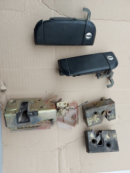 Замок дверний б/в оригінал VAG VW Т-4,Пассат Б3,Б4,Гольф ,Поло,Сеат