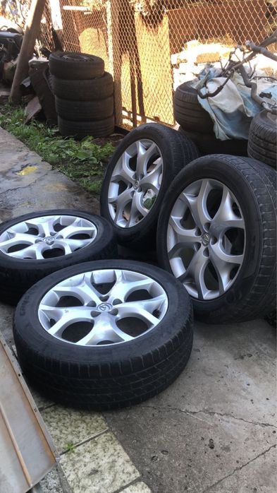Оригинальные диски с резиной и датчиками mazda cx7 235.55.19 restyling