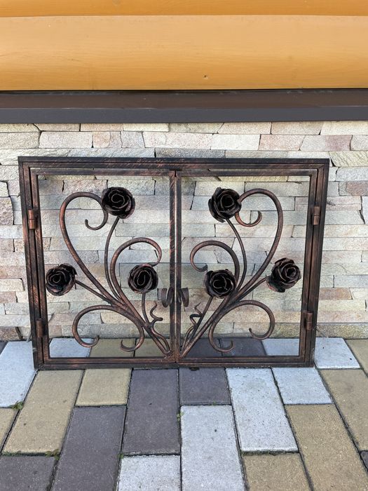 Кована камінна решітка