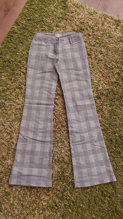 Spodnie w krate z szerszymi nagawkami 34