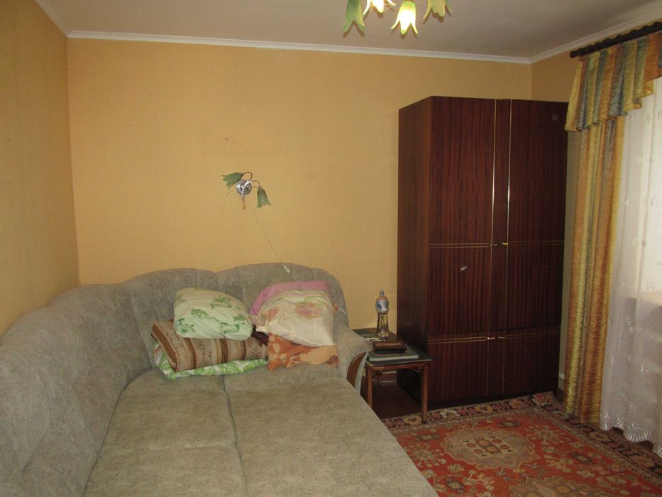 Продам частину будинку по вул. Тітова ( район Дитячої лікарні)