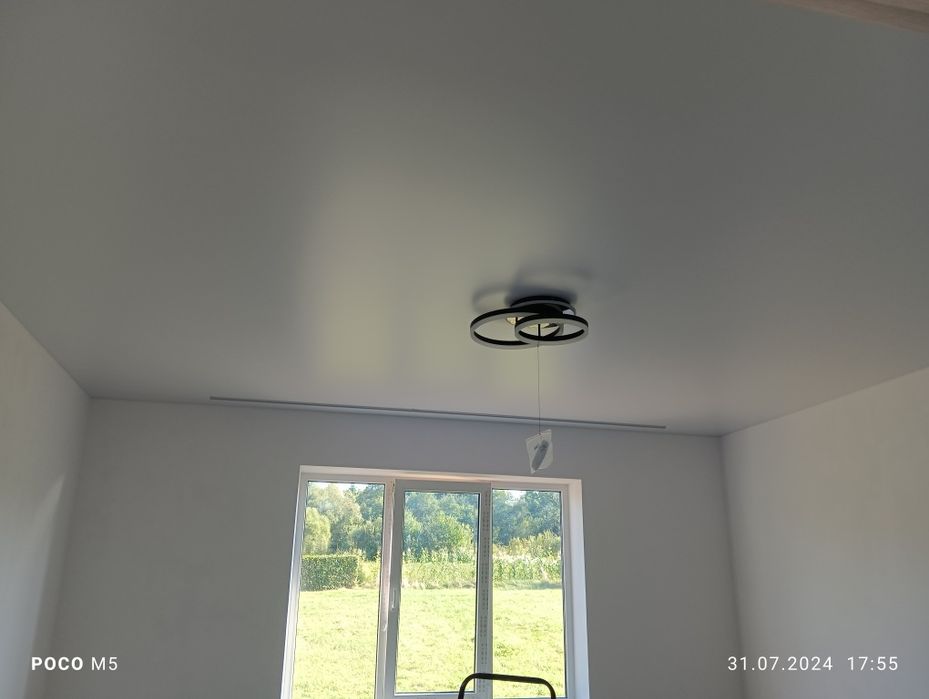 Натяжні стелі Modern House