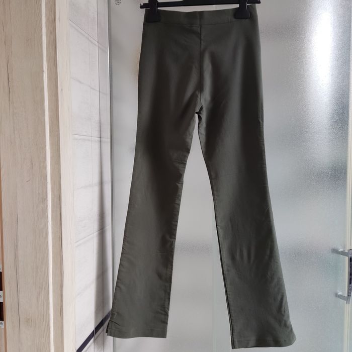 Spodnie khaki-damskie, szerokie dołem,rozm 36/38