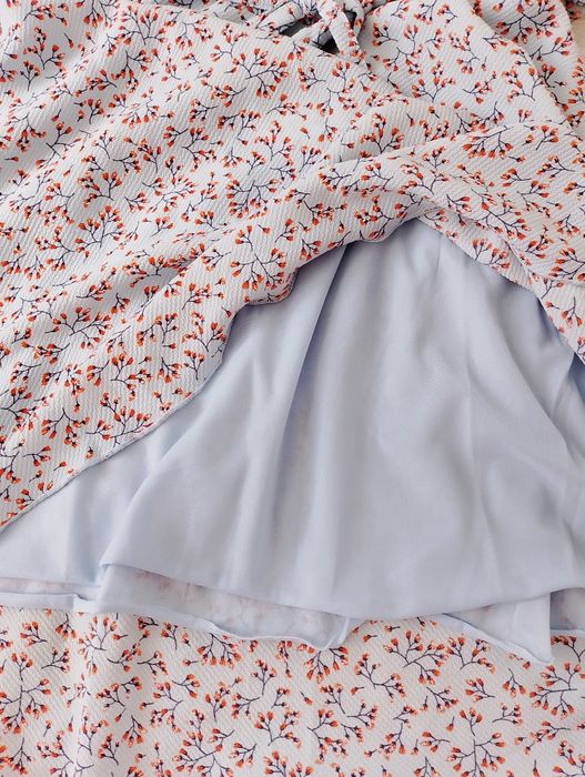 Rozkloszowana błękitna spódnica w kwiatki rozmiar 40/42 Blue motion 
D