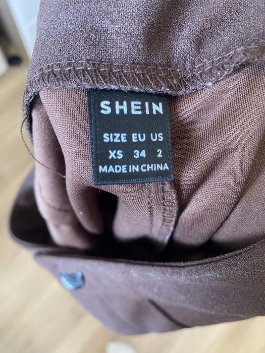 Damskie brązowe eleganckie spodnie XS dzwony