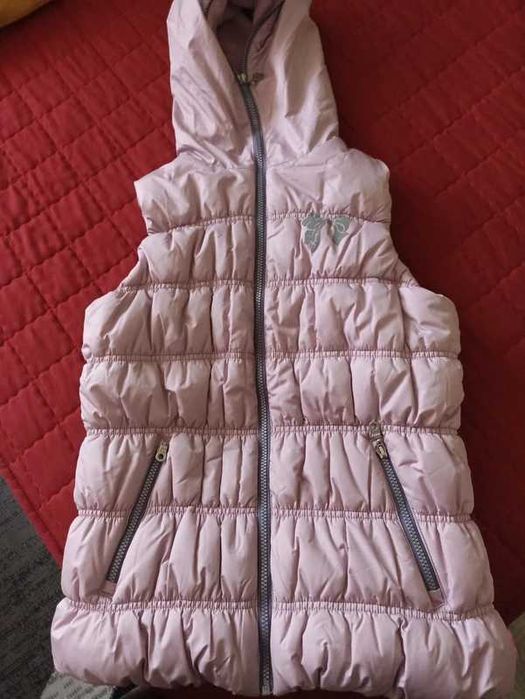 Cieply bezrekawnik dziewczecy ,damski M