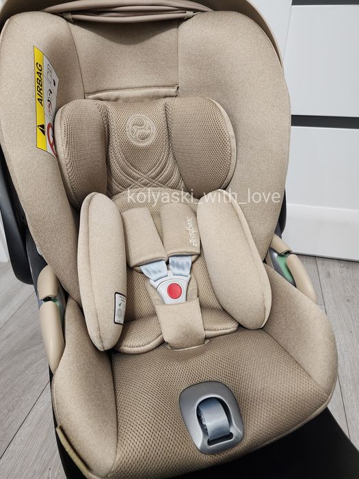 Розкладне автокрісло Cybex Cloud T plus i-size Cozy beige Сайбекс бежеве