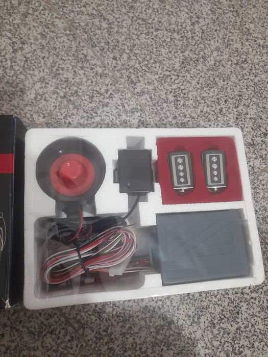 Alarme novo ainda embalado de carro.