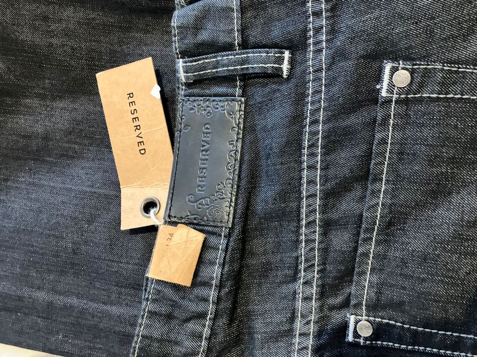 Spodnie dzwony Reserved