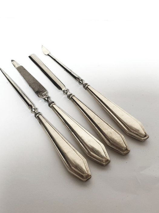 Set of 4 antique English silver manicure tools