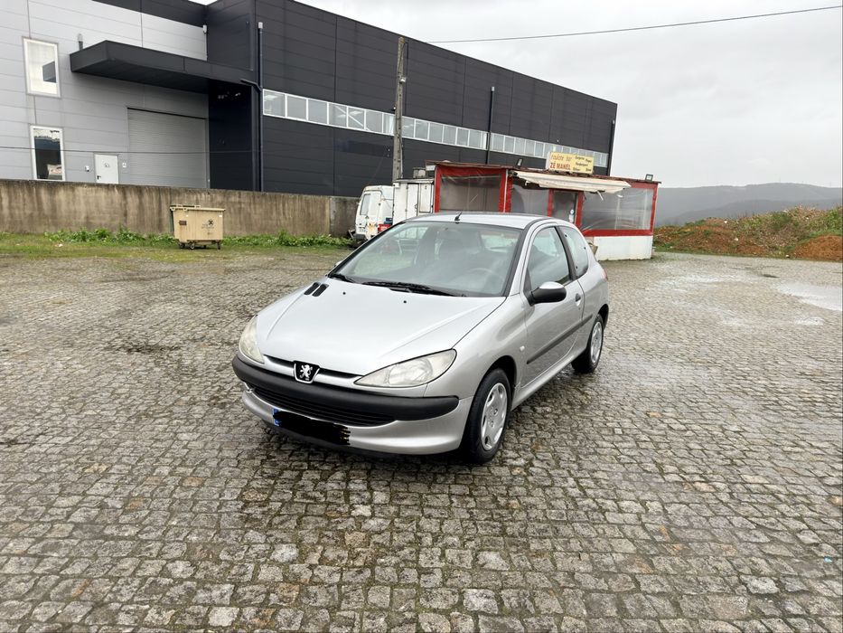 100 mil kms 206 comoletamente nova