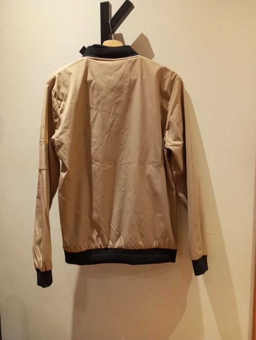 Casaco corta-vento castanho64751812454402123