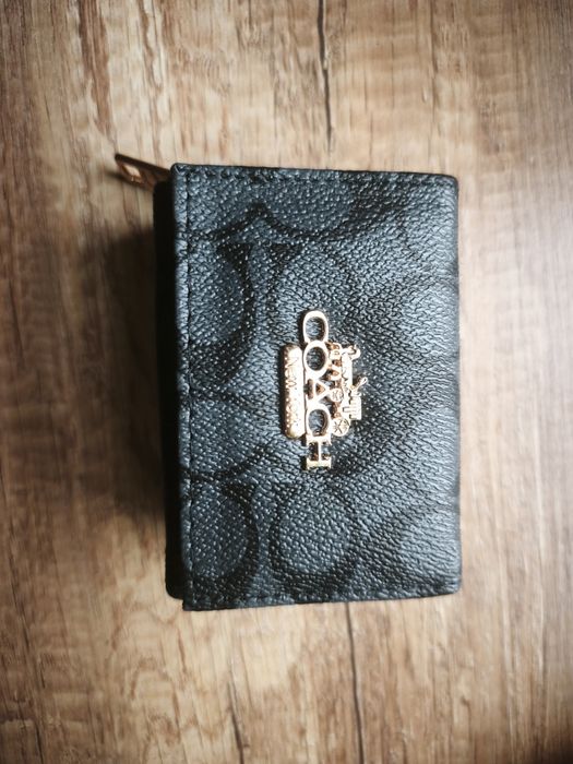 Portfele Coach nowe