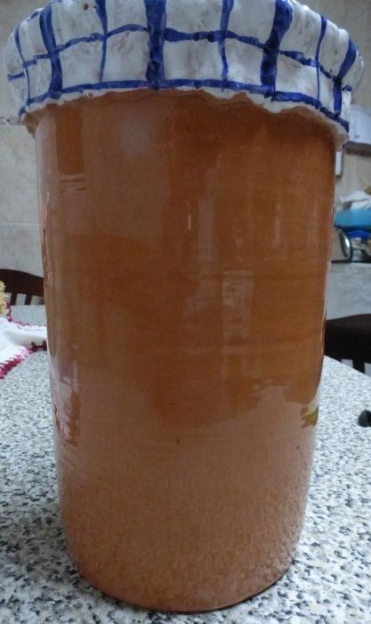 Clay bottle cooler.64286303294082122