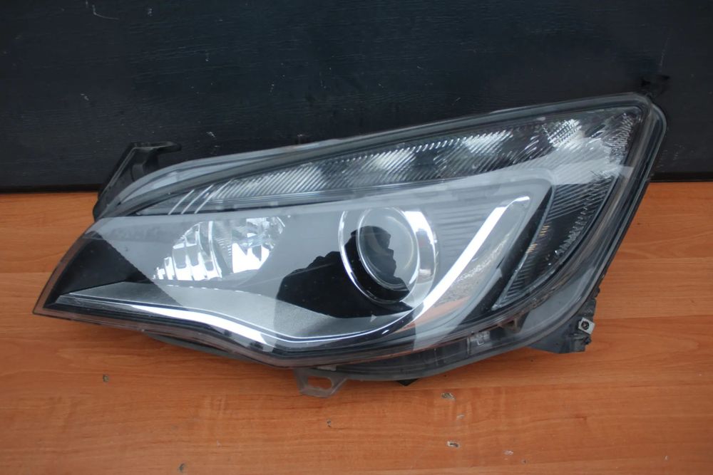 LAMPA LEWA PRZEDNIA LEWY PRZÓD OPEL ASTRA J BI-XENON EUROPA DEMONTAŻ ORYGINAŁ PRZED LIFT PO LIFT 13253650