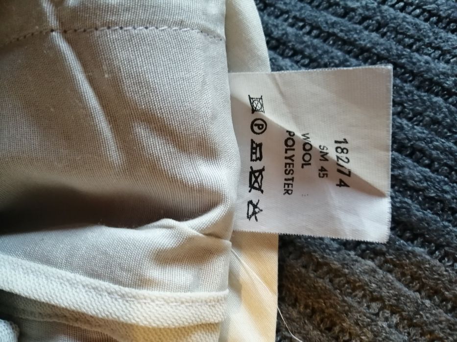 Jasne eleganckie spodnie garniturowe