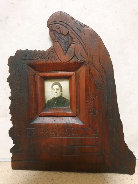 Antique unique hand-carved frame featuring Our Lady