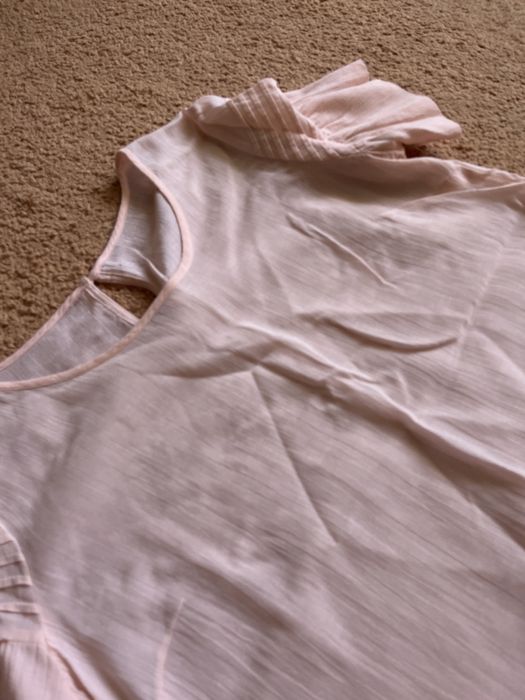 Віддам жіночу рожеву блузку