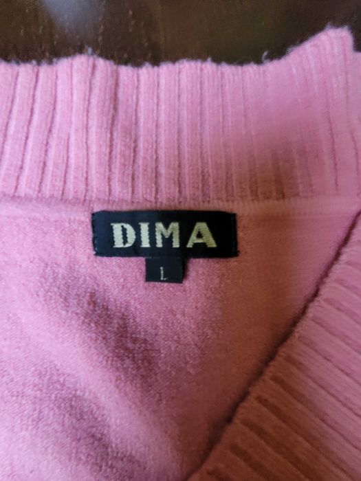 Damski, ciepły sweterek. Wełna merino 45%.