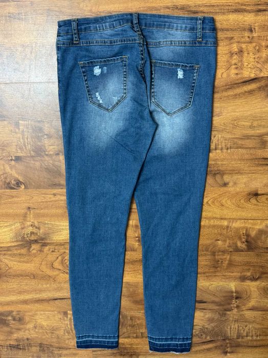 Spodnie jeansowe elastyczne rozdarciami jeansy stretch My Hailys L 40