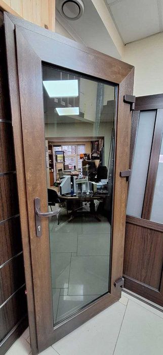 Вхідні металопластикові двері. Нові