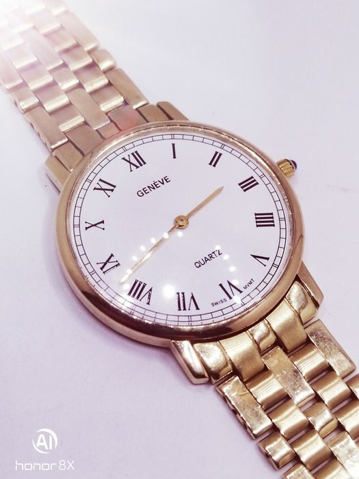 Золотые часы Geneve