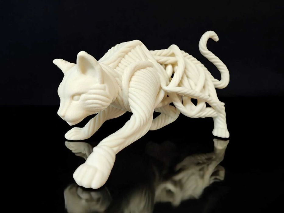 Escultura Gato Entrançado em Movimento