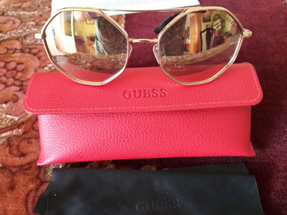 очки женские солнечные