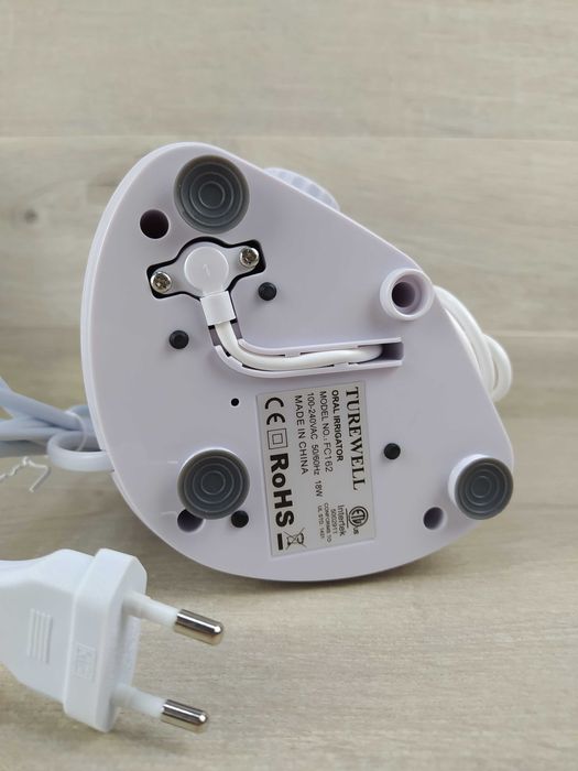 TUREWELL FC162 Elektryczny irygator do jamy ustnej OPIS