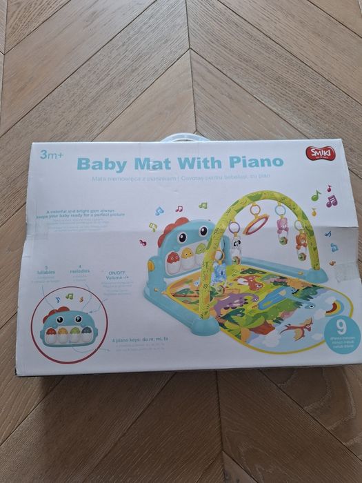 Mata niemowlęca z pianinkiem Smiki