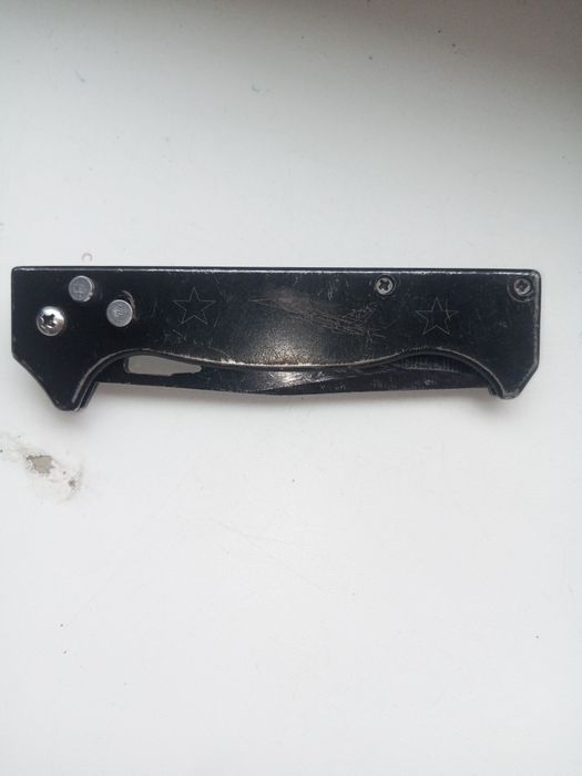 Открывачка для бутылок или для открывания конверты