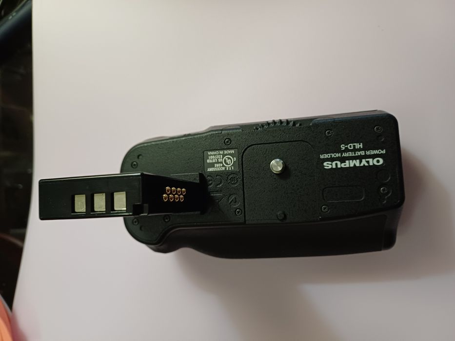 Punho Olympus modelo HLD-5