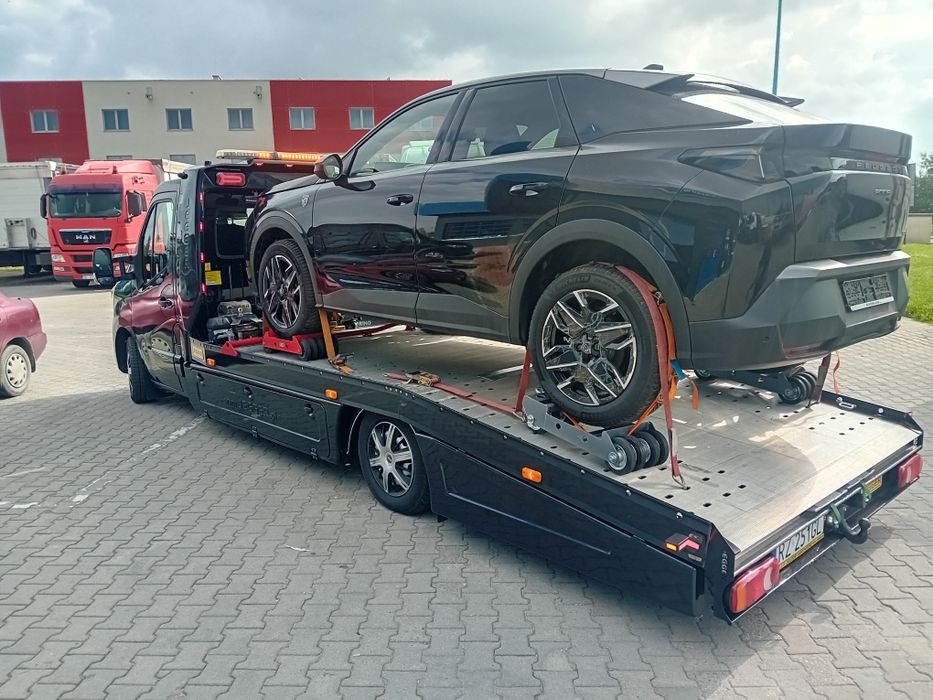 Pomoc drogowa  Tania laweta Transport między warsztatami
