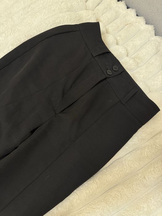 Брюки клеш з розрізом