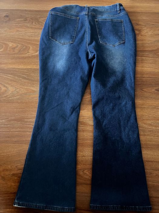 Нові жіночі джинси кльош на хутрі розмір XL