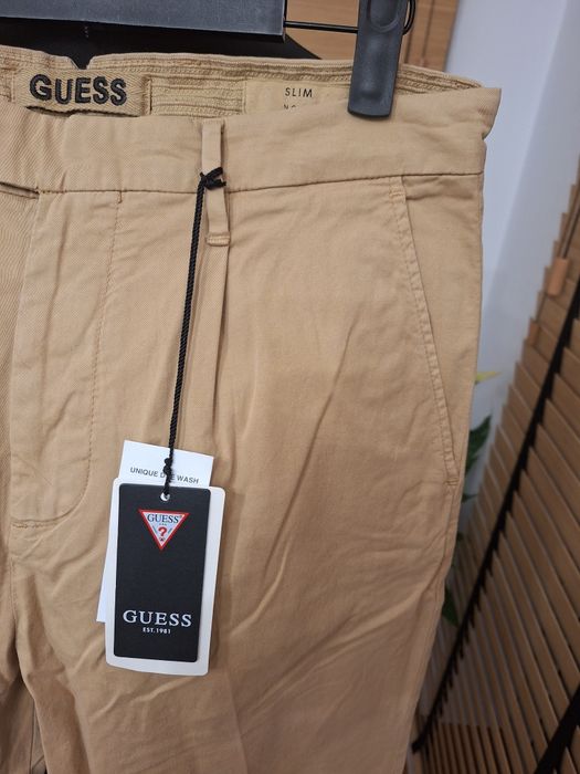 Guess, męskie spodnie chinosy, r. 30/32