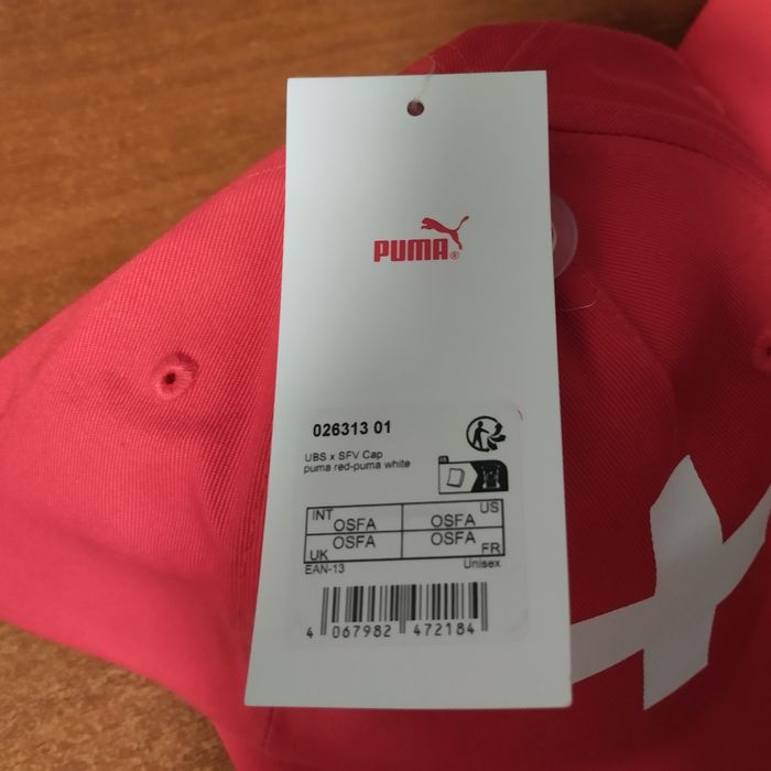 Кепки Puma і Emirates