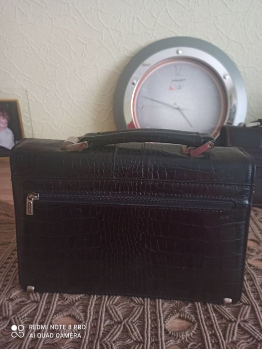 Чоловічі  барсетки  з натуральної шкіри