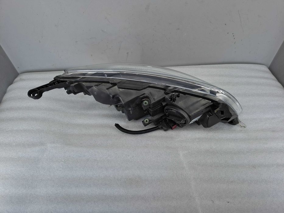 Lampa reflektor Lewy Opel Astra J IV