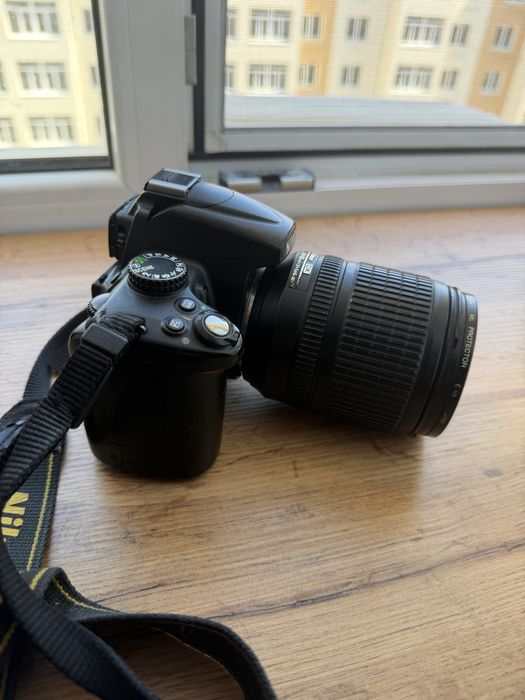 Продам Nikon D5000 + Nikon 18-105mm VR. + SD32GB + кейс