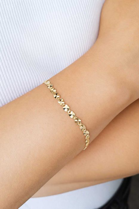 Złota bransoletka z płaskimi, diamentowanymi ogniwami 19 cm pr. 585