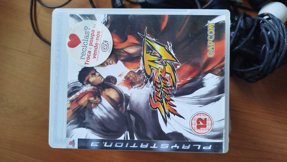 PlayStation 3 , 14 jogos, 2 comandos, 2 microfones