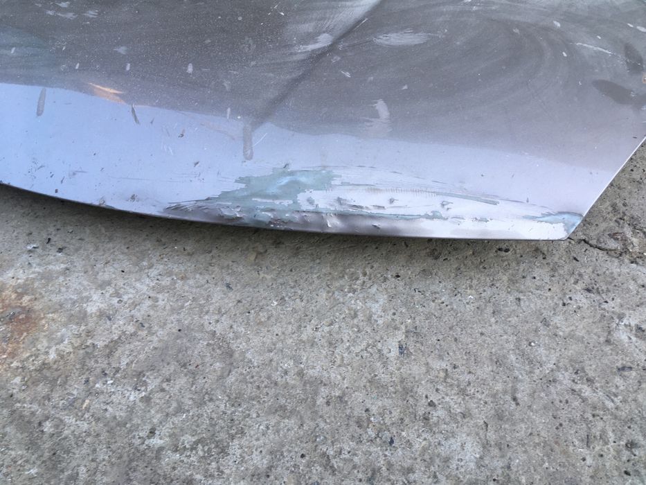 Капот на nissan note 2009