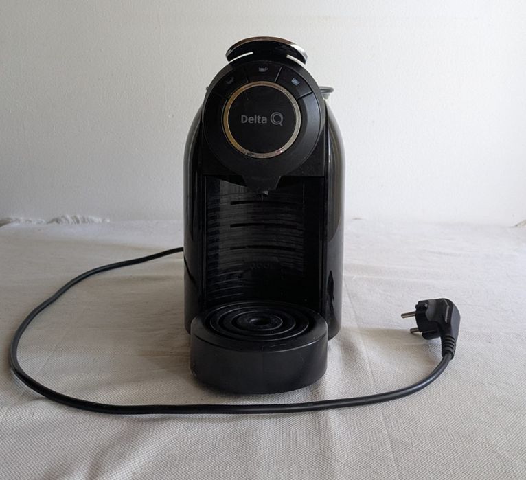 Máquina café Delta Q - trabalha mas não fura cápsulas