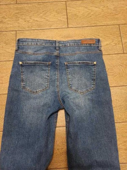 Джинси кльош на високу дівчину