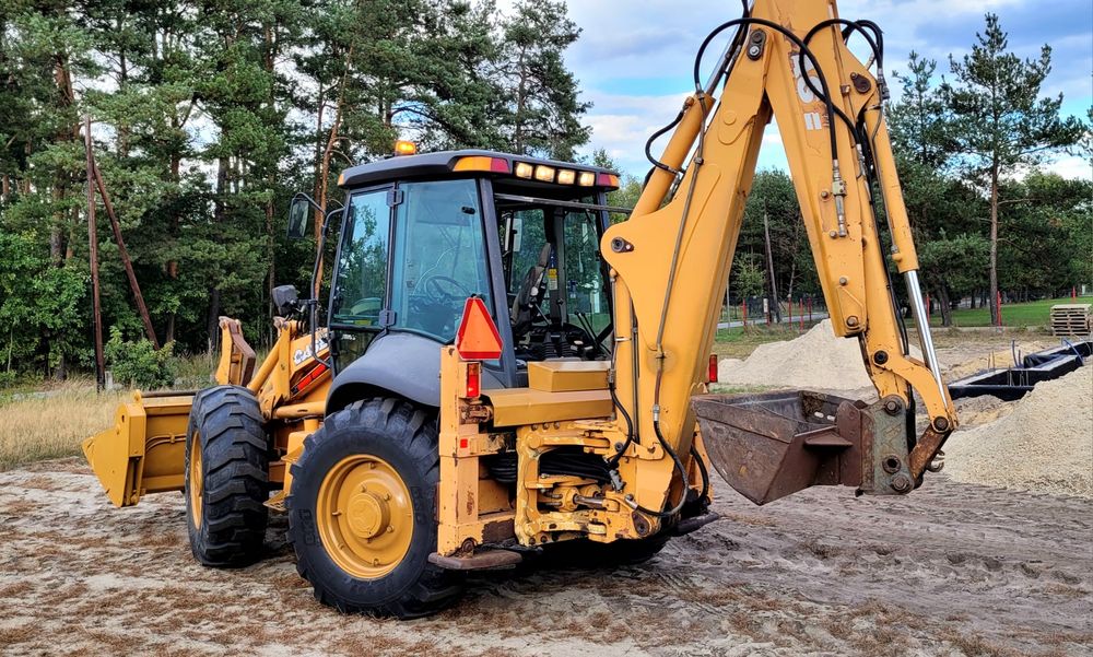 Koparko ładowarka CASE 695 Sprowadzona, CAT, JCB, NEW HOLLAND